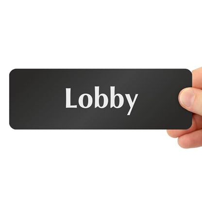 SmartSign Lobby Door Sign, 2" x 6", 20 mil Thick Anodized Aluminum Material, Strong Adhesive Backing, Waterproof, Sealed Legend, Black and Silver, Pack of 1, USA Made - color: White