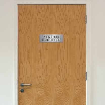 Silver Please Use Other Door Sign / 3" x 9" Easy Adhesive Door Wall Mount/Restaurant Small Business Alternative Exit Room Sign/Made In The USA - color: Silver, style: Please Use Other Door